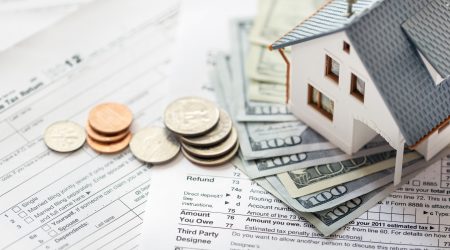 miniature-house-money-on-tax-450w-386646052